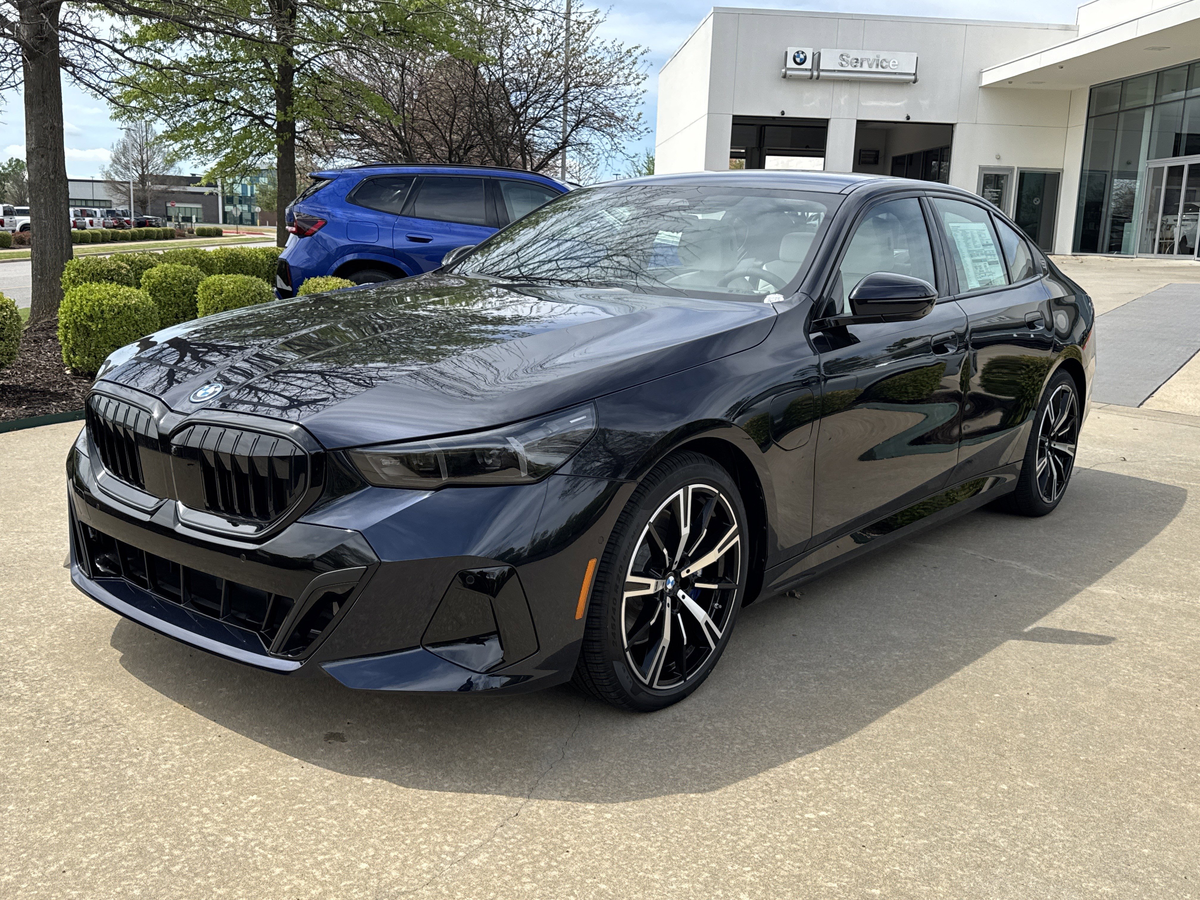 2026 BMW 5 Series 550e xDrive Sedan's photo