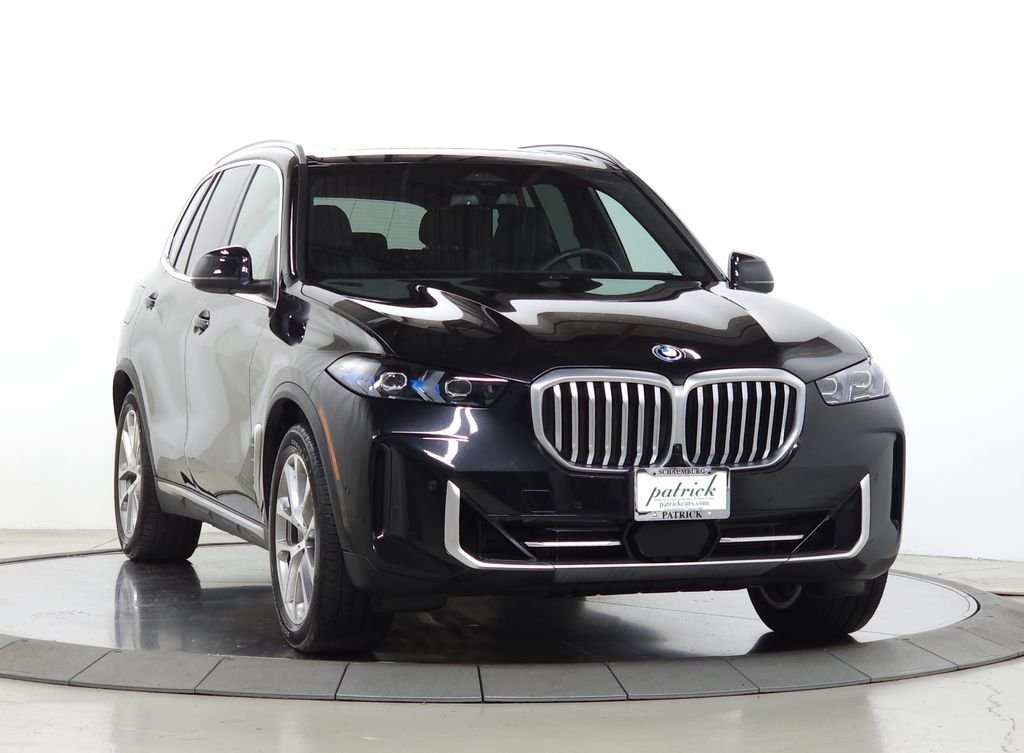 Used 2026 Black Sapphire Metallic BMW xDrive50e image 1