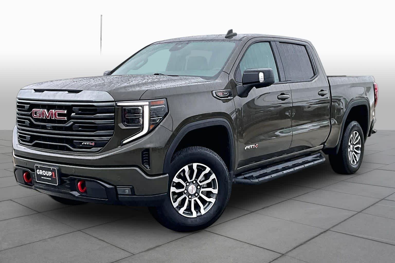 Used 2023 Deep Bronze Metallic GMC AT4 image 2