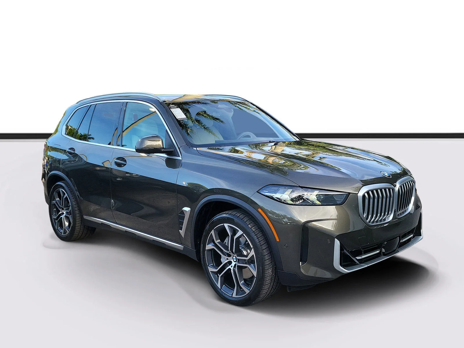Used 2024 Manhattan Green Metallic BMW sDrive40i image 1