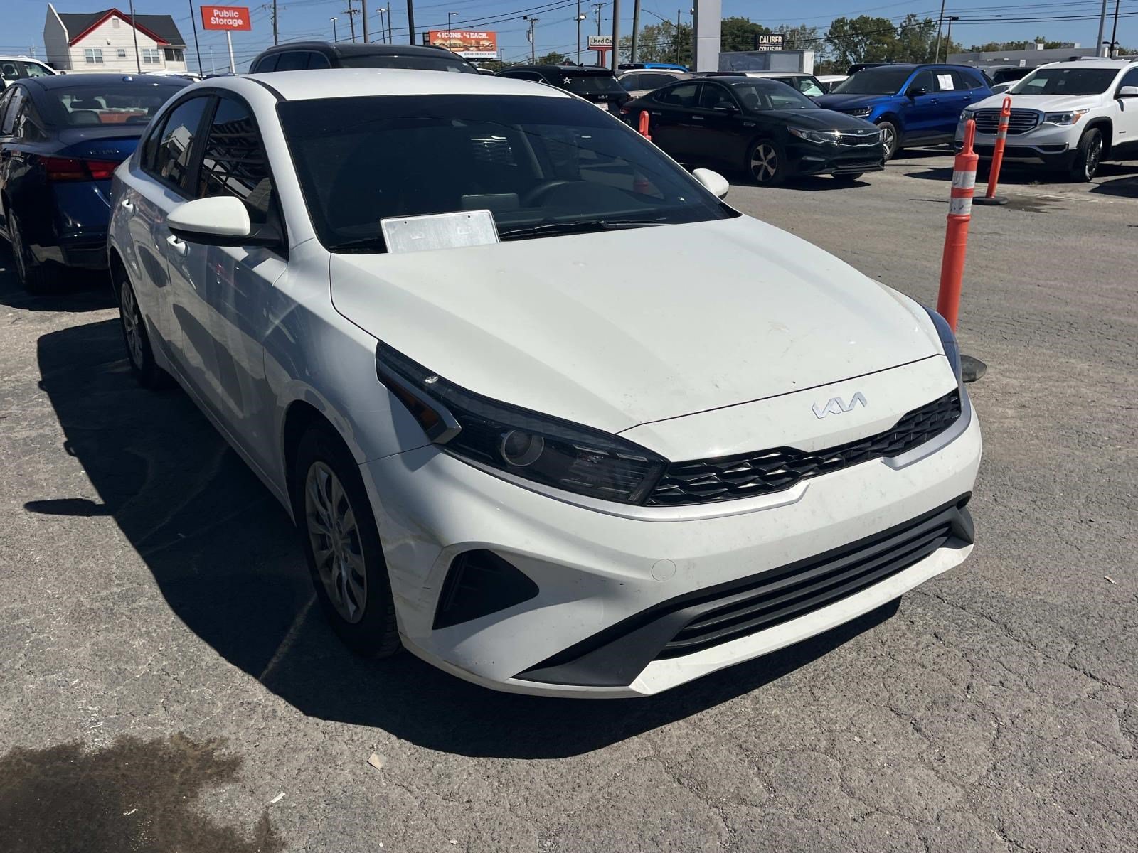 Used 2023 Clear White Kia LX image 1