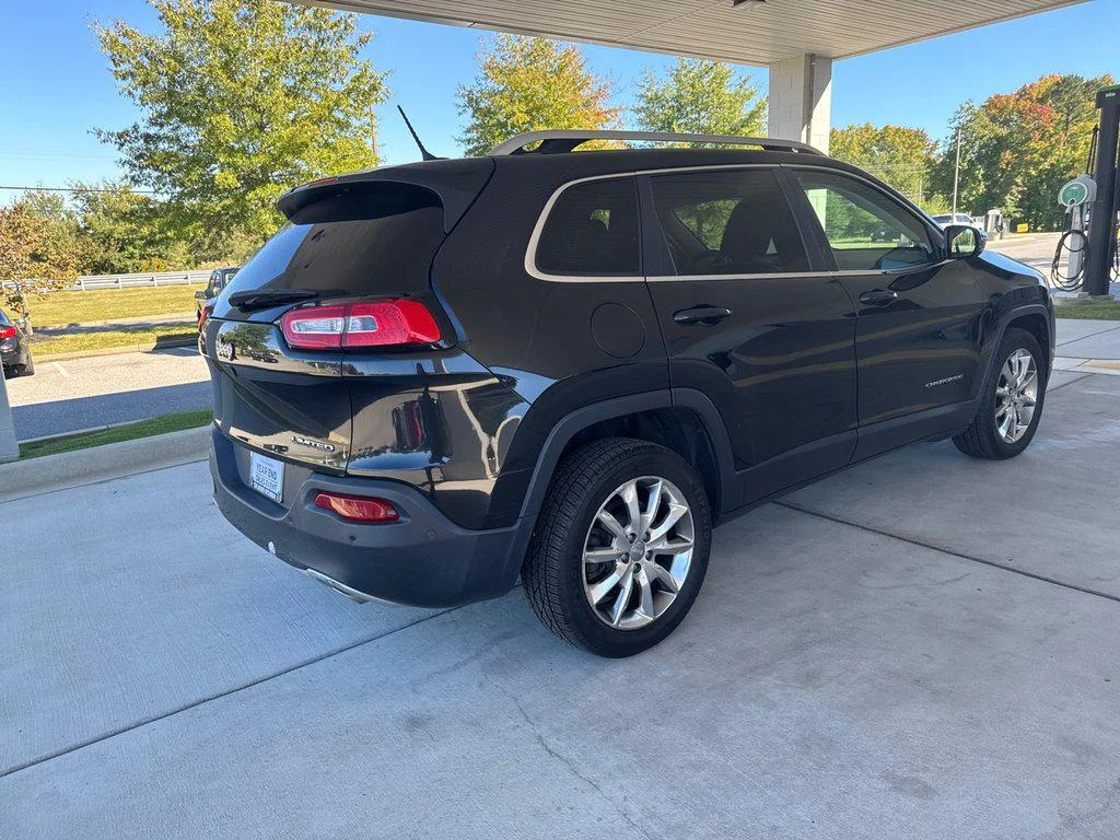 Used 2014 Brilliant Black Crystal Pearlcoat Jeep FWD 4dr Limited image 2