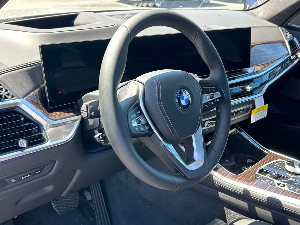New 2026 Black Sapphire Metallic BMW xDrive50e image 13