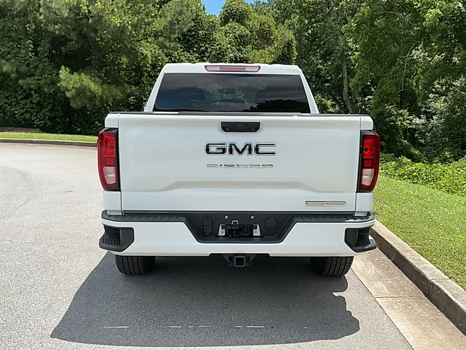 Used 2024 Summit White GMC 4WD Crew Cab Short Box Elevation with 3SB image 16