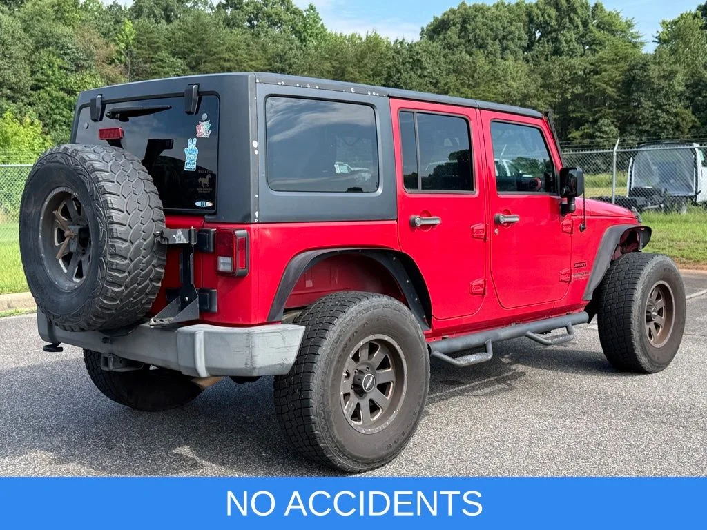 Used 2014 Red Jeep Unlimited Sport image 5