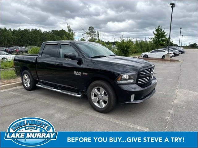 Used 2014 Black Clearcoat Ram Sport image 1