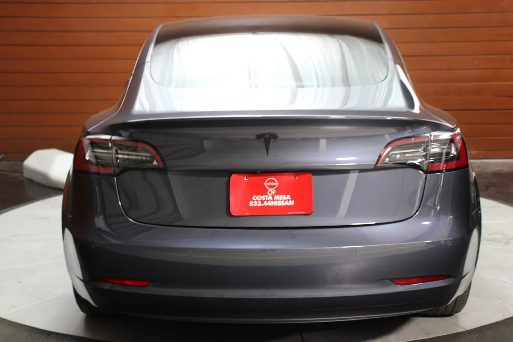 Used 2021 Tesla Model 3 Base with VIN 5YJ3E1EA6MF982453 for sale in Costa Mesa, CA
