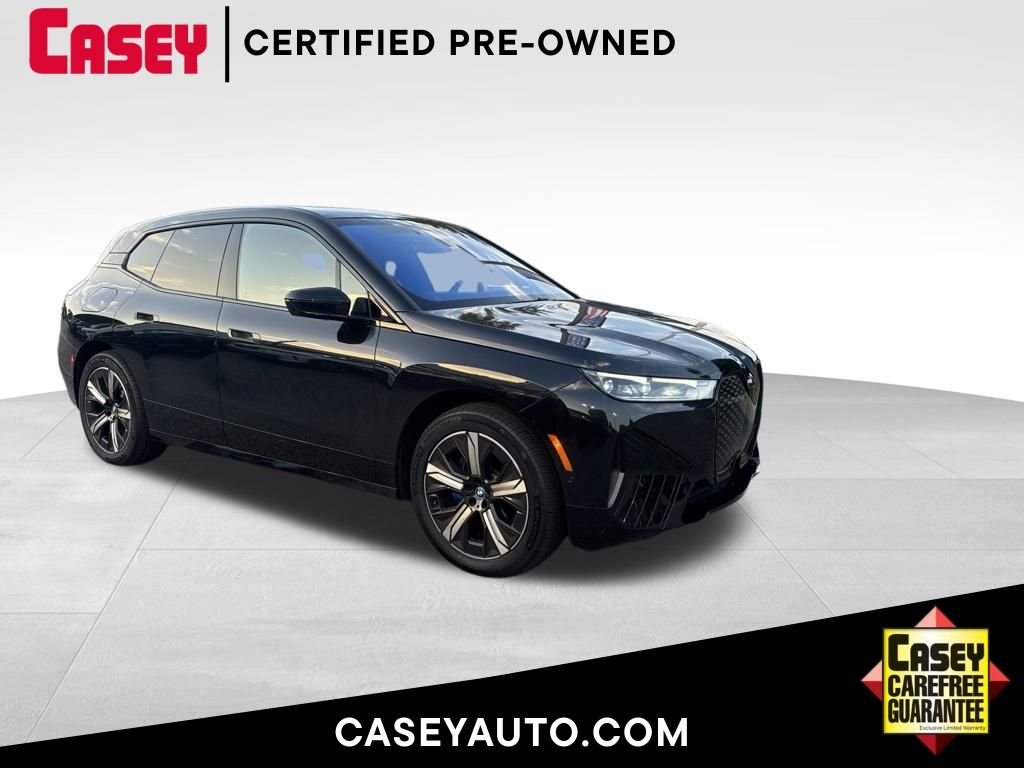 Used 2024 Black BMW xDrive50 image 1