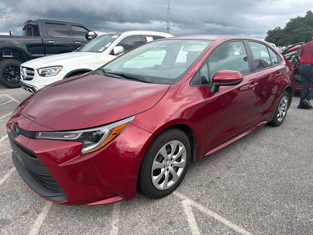 Used 2025 Red Toyota LE image 1