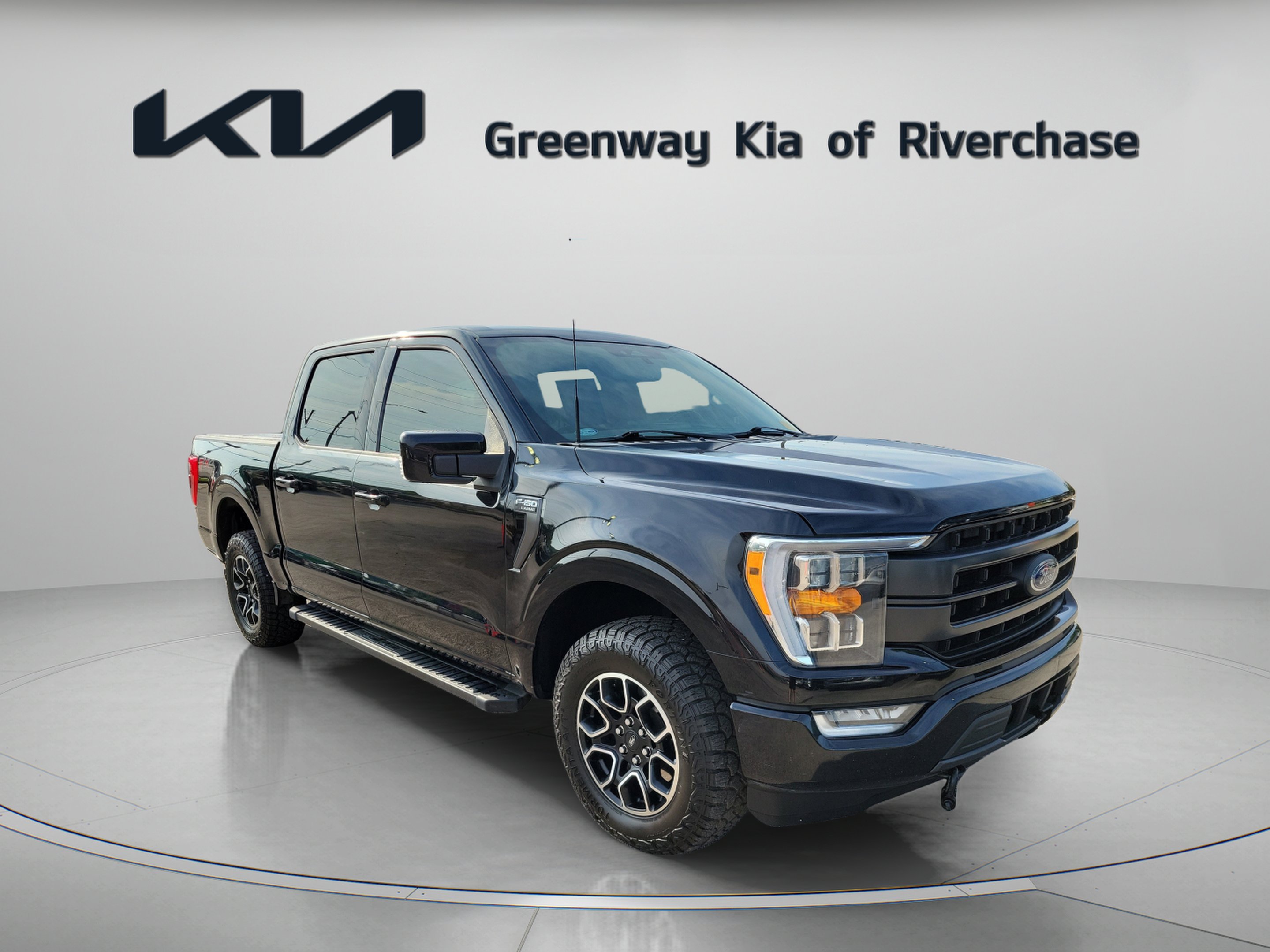 Used 2022 Black Metallic Ford Lariat image 1