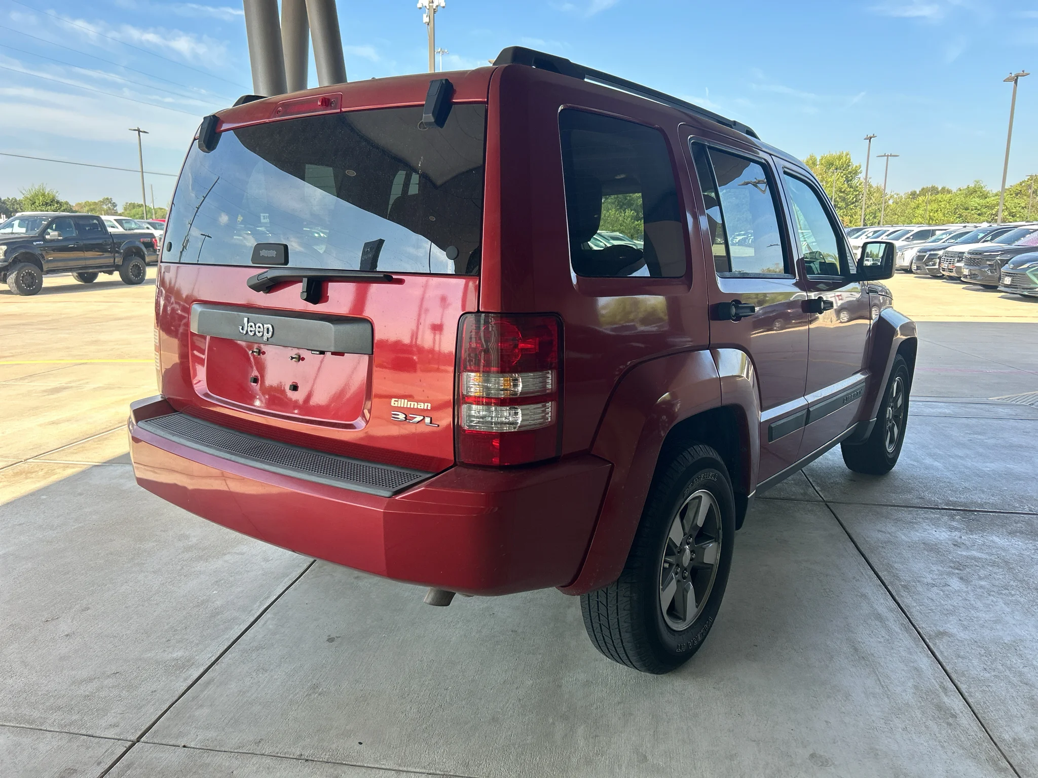 Used 2008 Inferno Red Crystal Pearlcoat Jeep Sport image 2