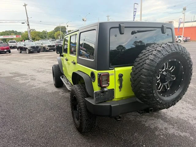 Used 2017 Green Jeep Unlimited Sport image 2