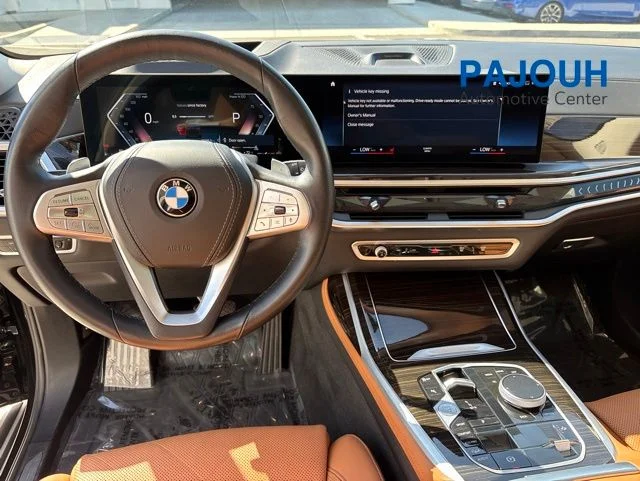 Certified Used 2023 Black Sapphire Metallic BMW xDrive40i image 13