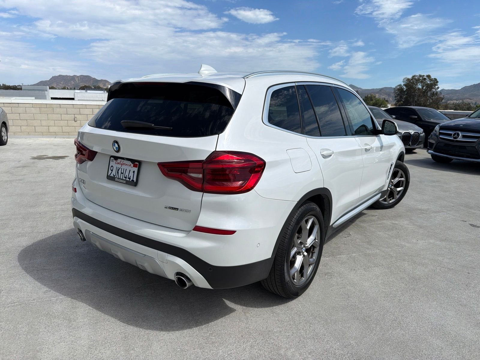 Used 2021 Mineral White Metallic BMW sDrive30i image 4