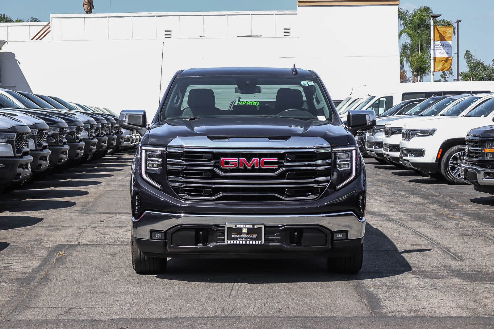 Used 2025 Titanium Rush Metallic GMC SLT image 2