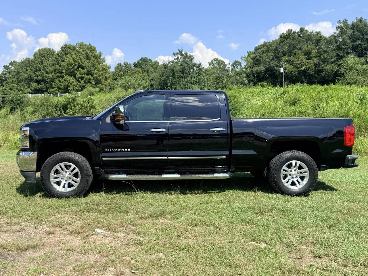 Used 2017 Black Chevrolet LTZ 4x4 4dr Crew Cab 6.5 ft. SB image 2
