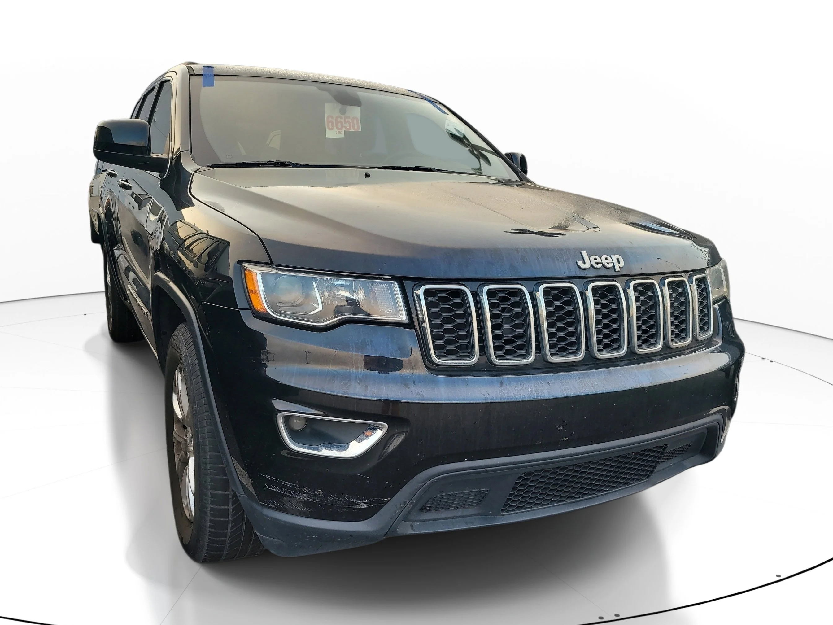 Used 2021 Diamond Black Crystal Pearlcoat Jeep Laredo E image 1