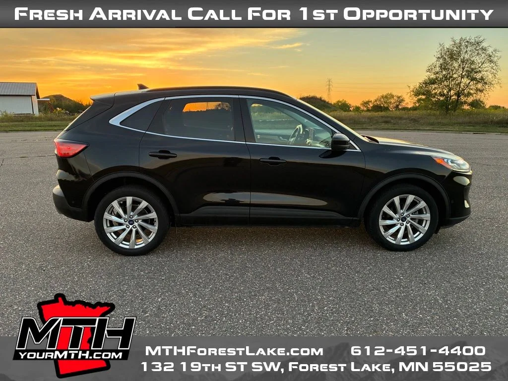 Used 2021 Black Ford Titanium image 1