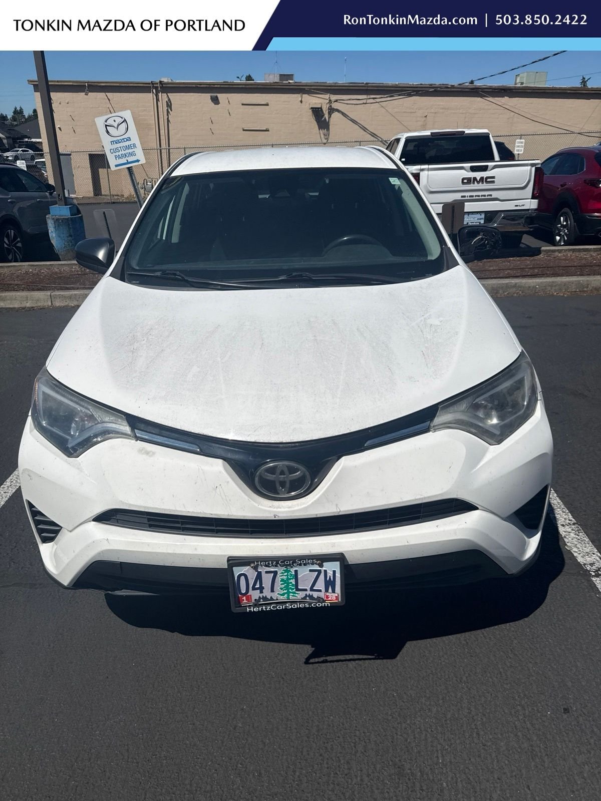 Used 2018 Super White Toyota LE image 1