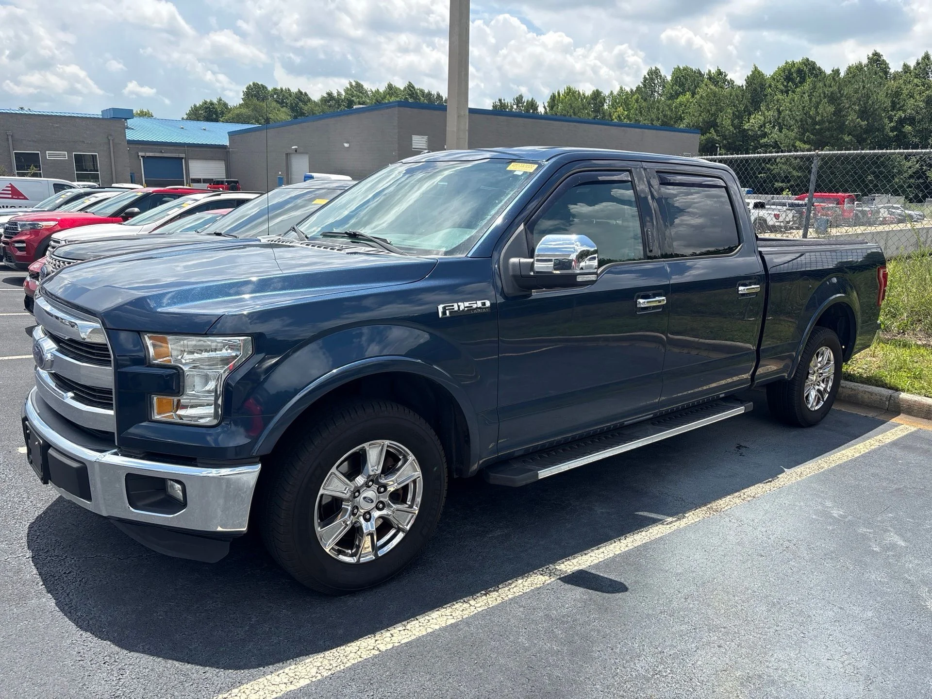 Used 2015 Blue Ford Lariat image 1