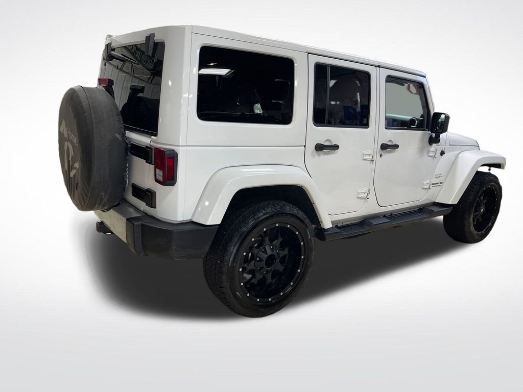 Used 2014 White Jeep Unlimited Sahara image 8