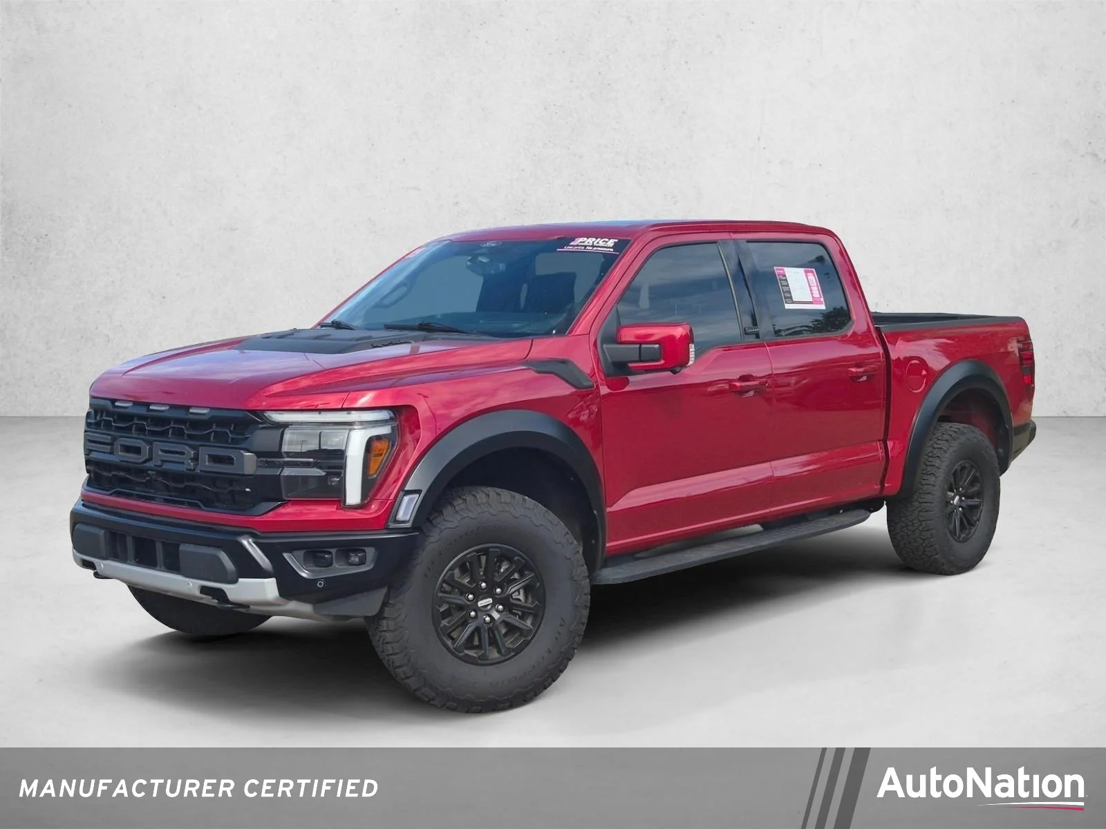 Certified Used 2025 Rapid Red Metallic Tinted Clearcoat Ford Raptor image 1