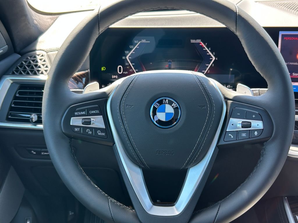 New 2026 Black Sapphire Metallic BMW xDrive50e image 18