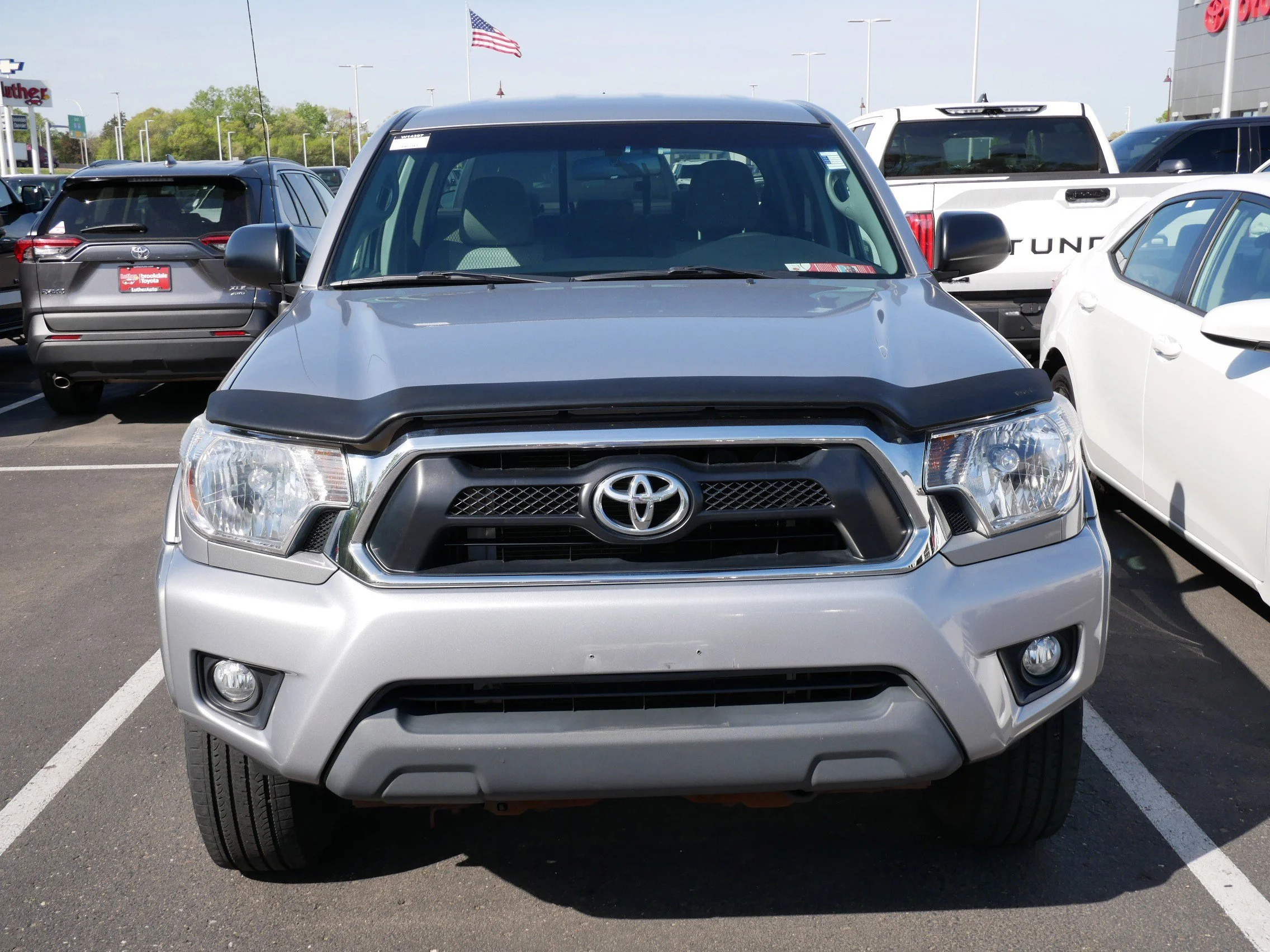 Used 2014 Toyota Tacoma Base with VIN 5TFMU4FN2EX024394 for sale in Brooklyn Center, Minnesota