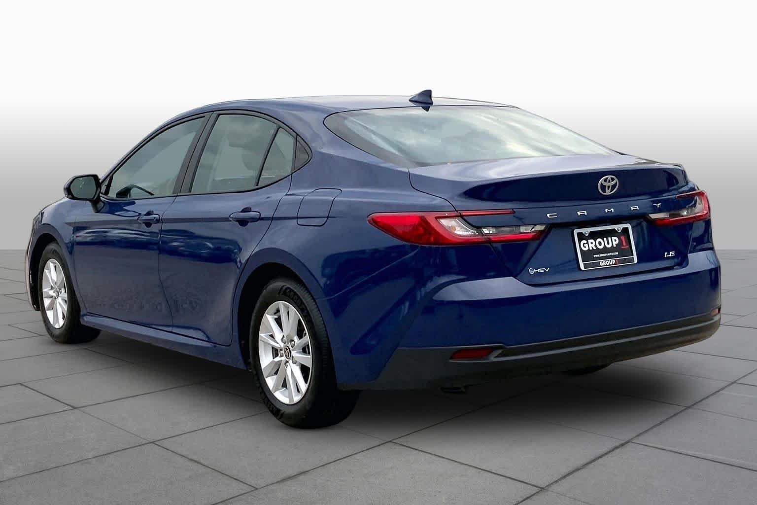 Used 2025 Reservoir Blue Toyota LE image 12