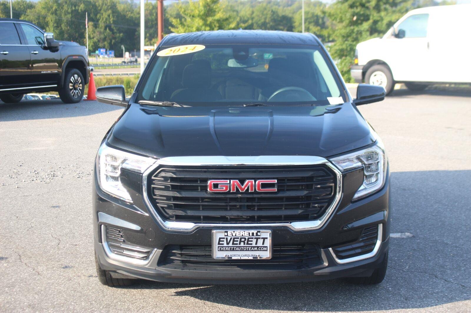 Used 2024 Ebony Twilight Metallic GMC SLE image 2