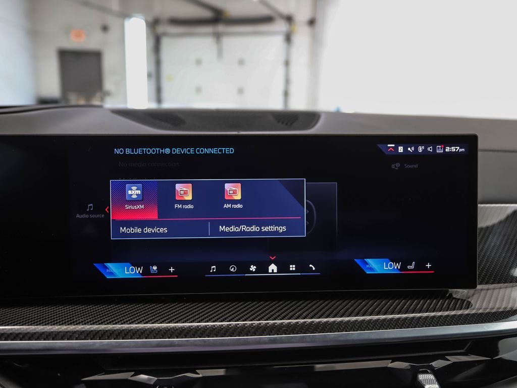 Used 2026 Black Sapphire Metallic BMW M60i image 17
