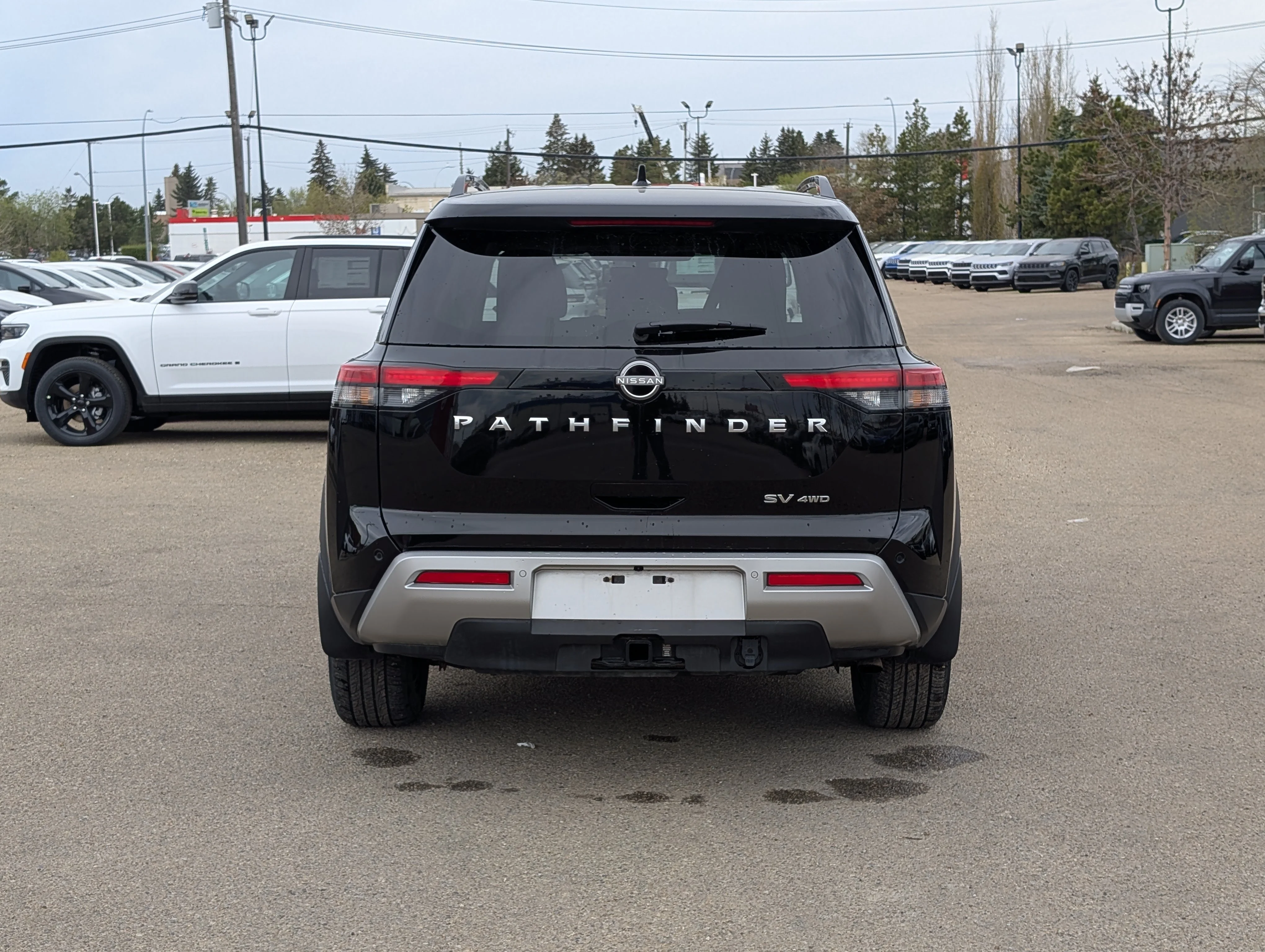 Used 2024 Gun Metallic Nissan SV image 5