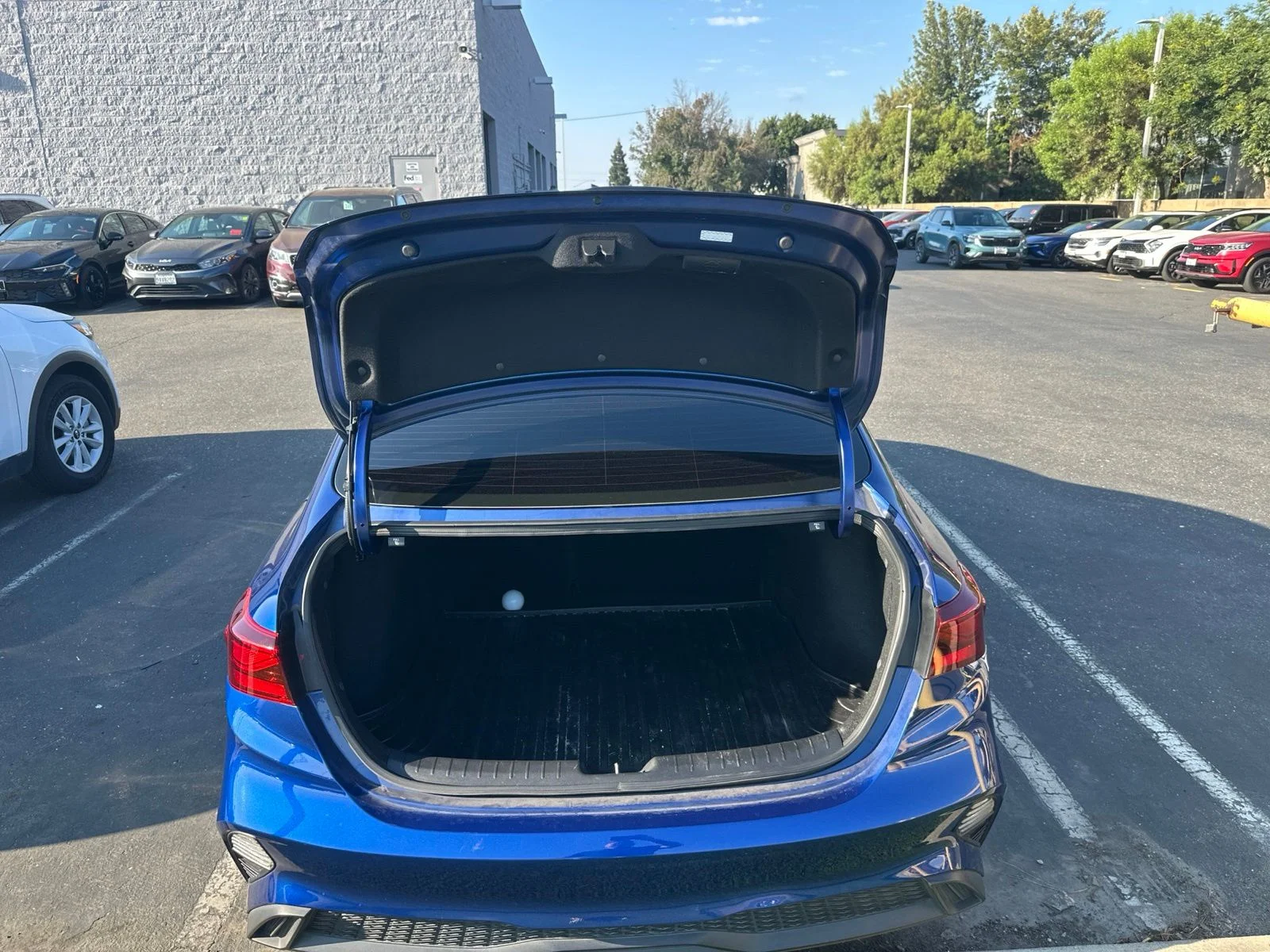 Used 2023 Deep Sea Blue Kia LXS image 10