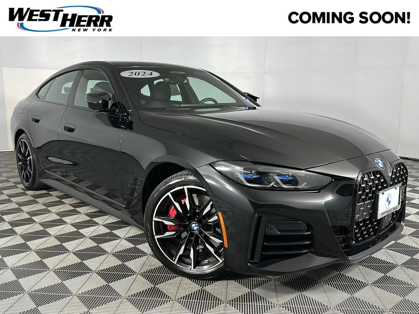 Used 2024 Black Sapphire Metallic BMW M440i xDrive image 1