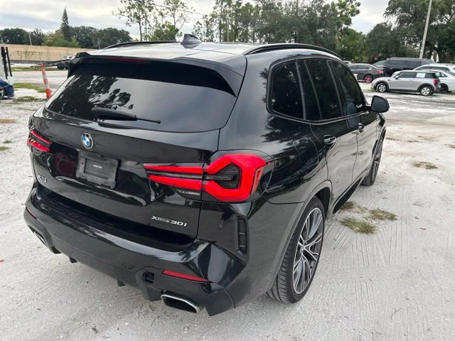 Used 2022 Black Sapphire Metallic BMW xDrive30i image 4