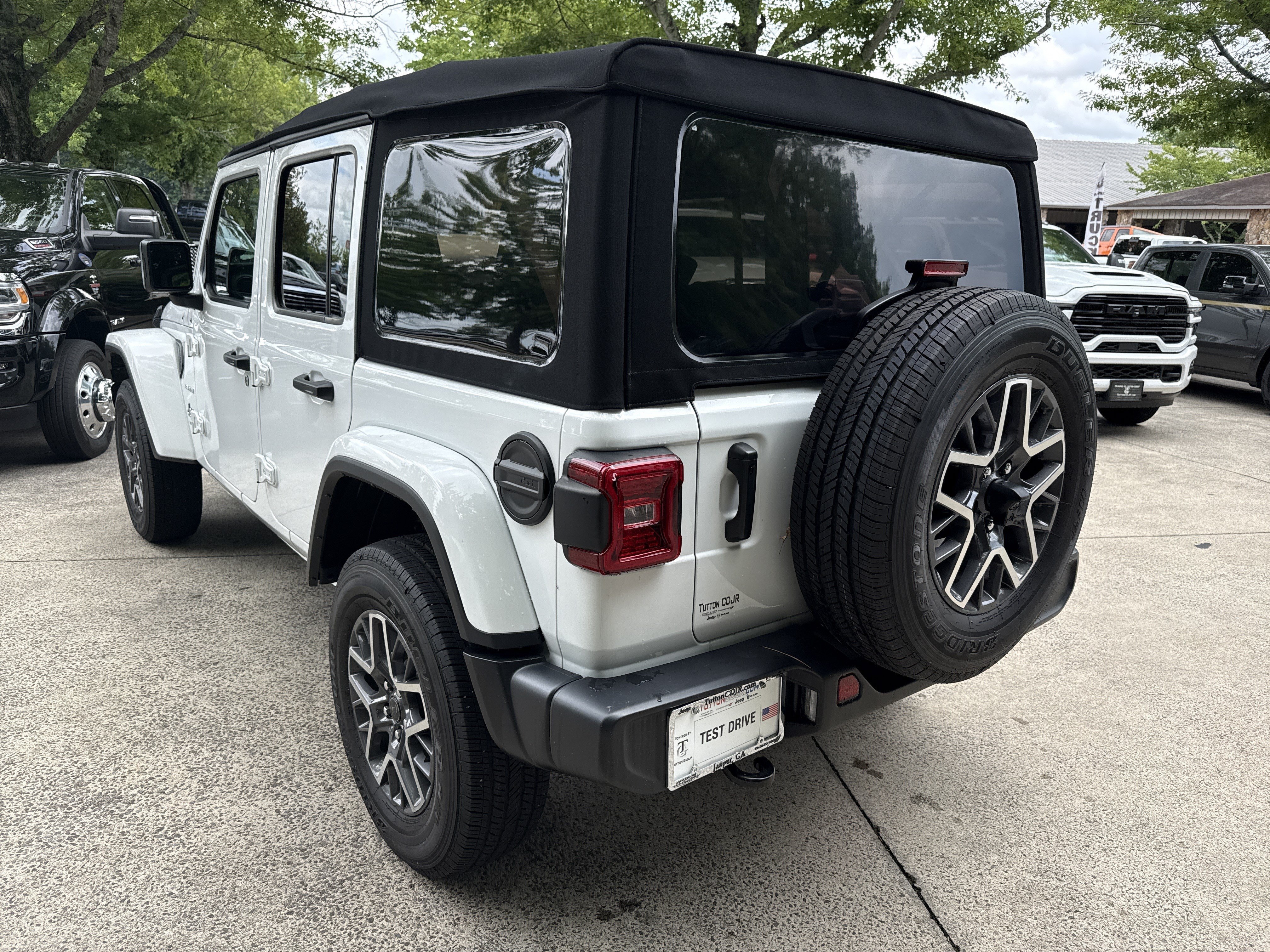 Used 2024 Bright White Clearcoat Jeep Sahara image 5