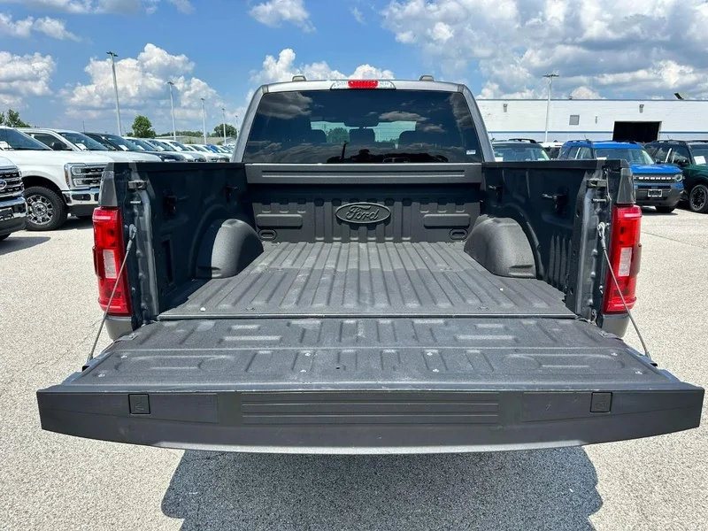 Used 2021 Carbonized Gray Metallic Ford XLT 4WD SuperCrew 5.5