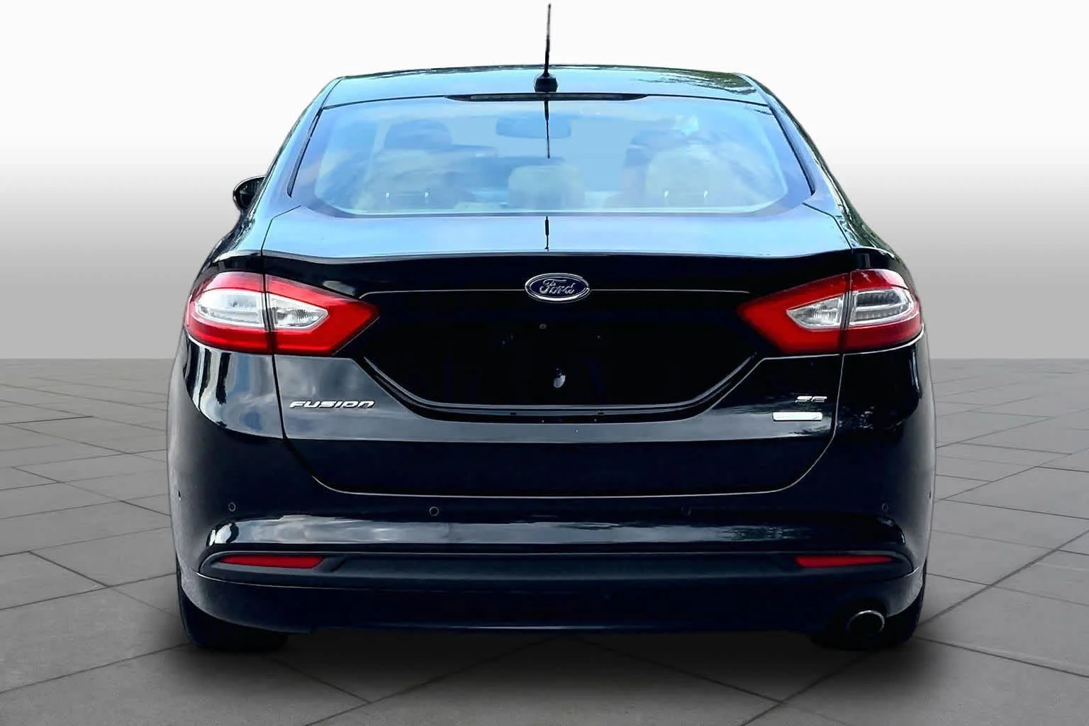 Used 2014 Tuxedo Black Metallic Ford SE image 4