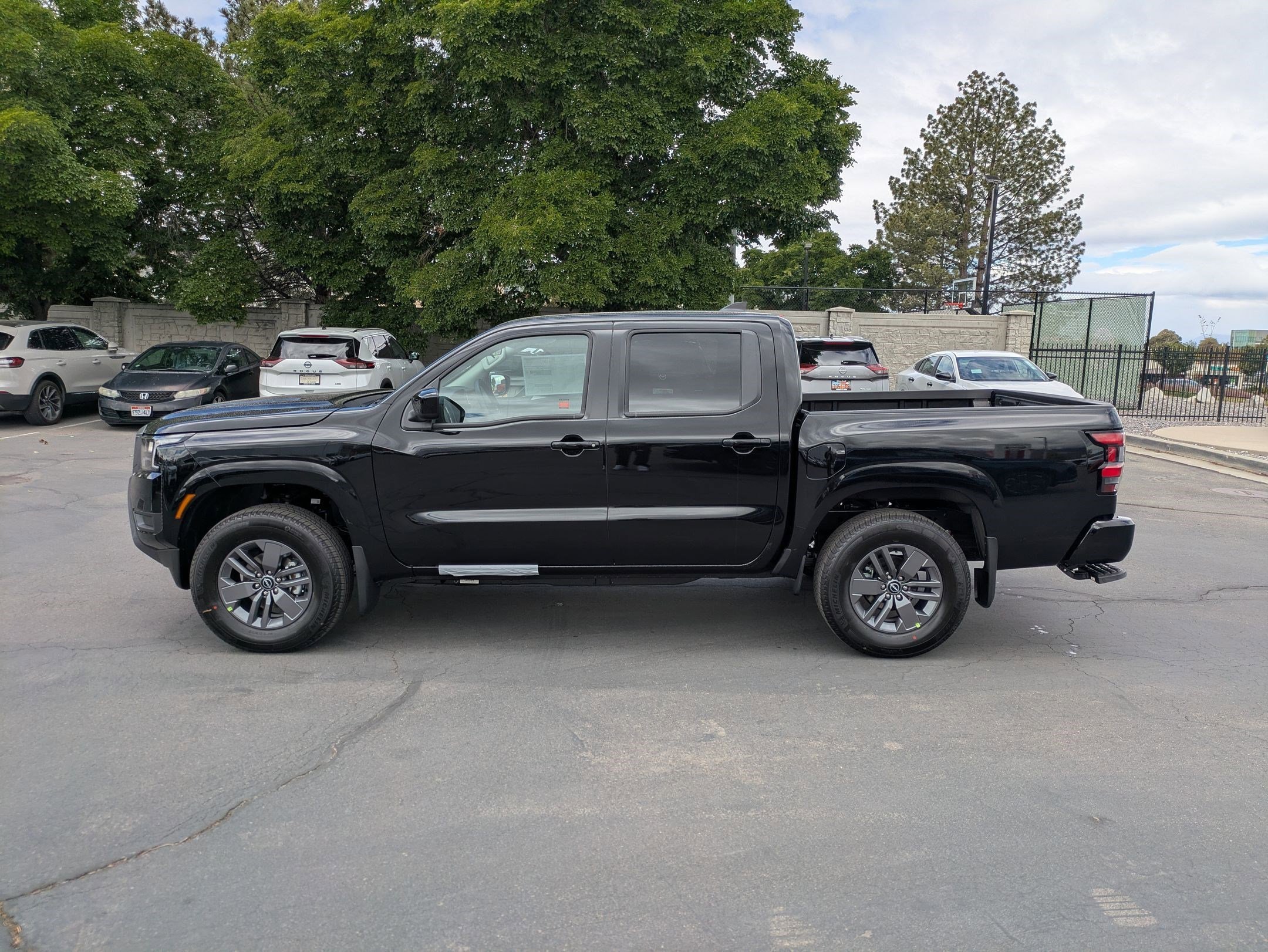 New 2026 Super Black Nissan Crew Cab SV image 7