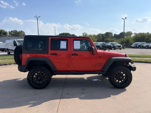 Used 2015 Orange Jeep Unlimited Sport image 6