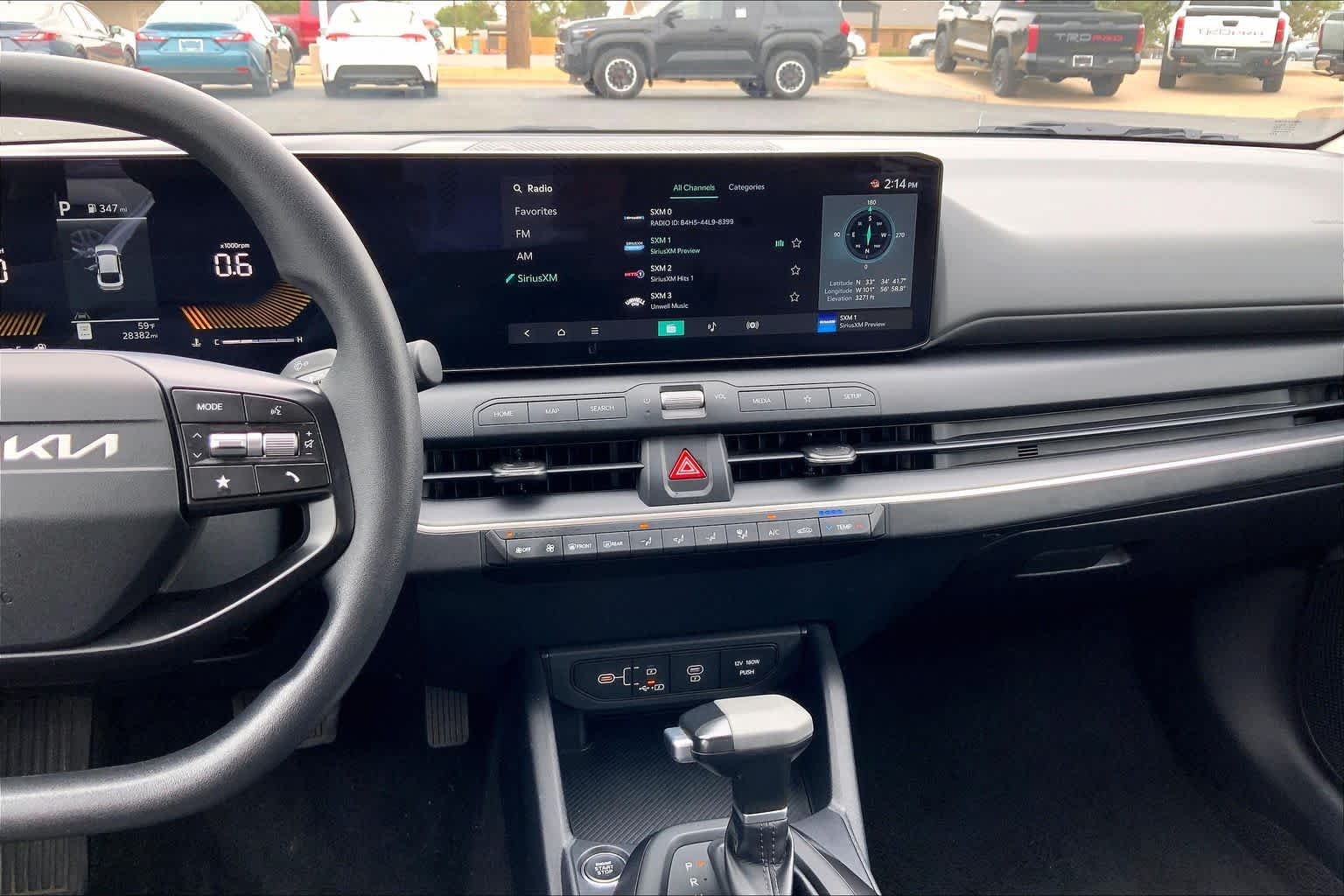 Used 2025 Snow White Pearl Kia LXS image 7