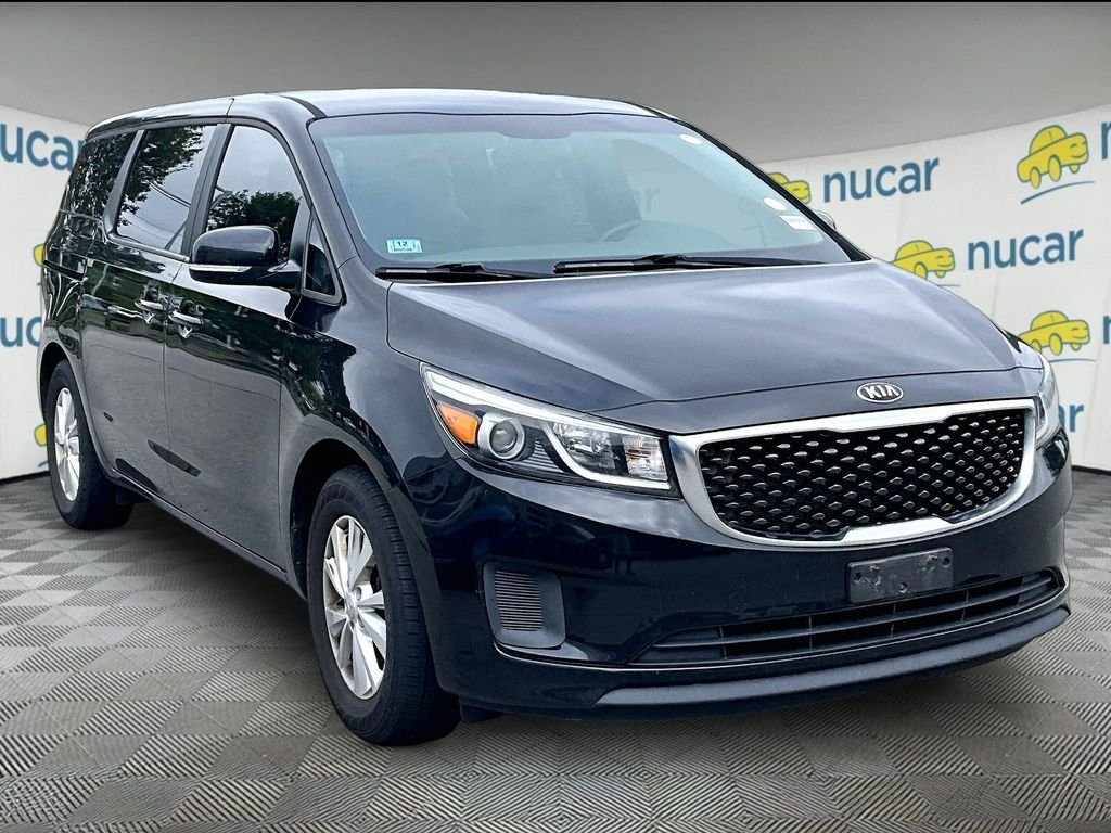 Used 2017 Black Kia L image 1