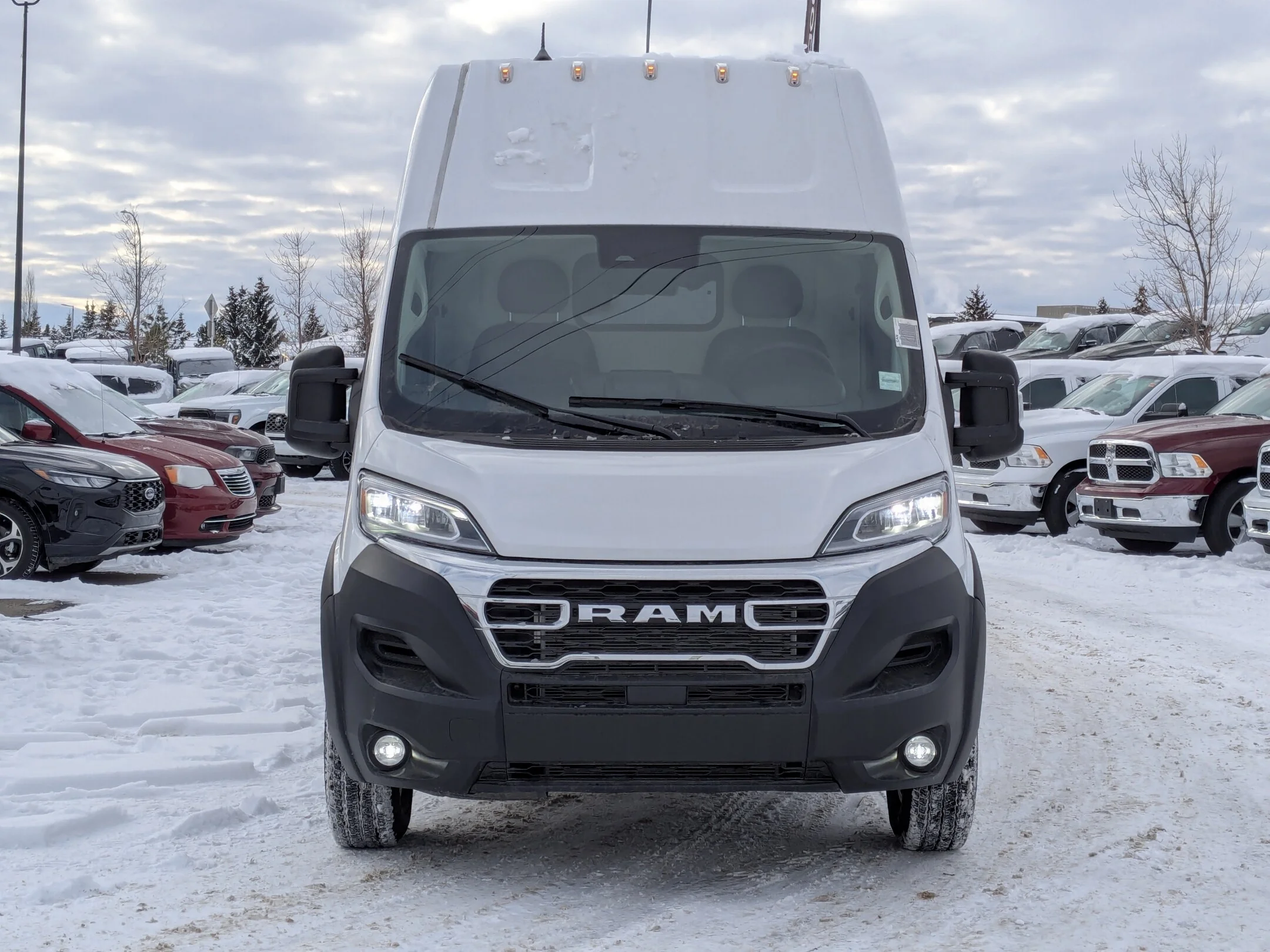 New 2026 White RAM SLT - - FWD - Super High Roof - Package 22G - LED Headlamps - Cargo Partition & More! image 3