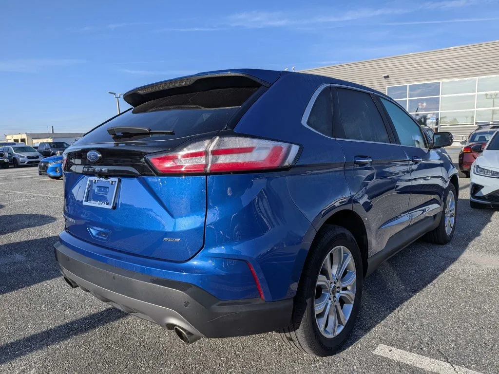 Certified Used 2024 Blue Metallic Ford Titanium image 3