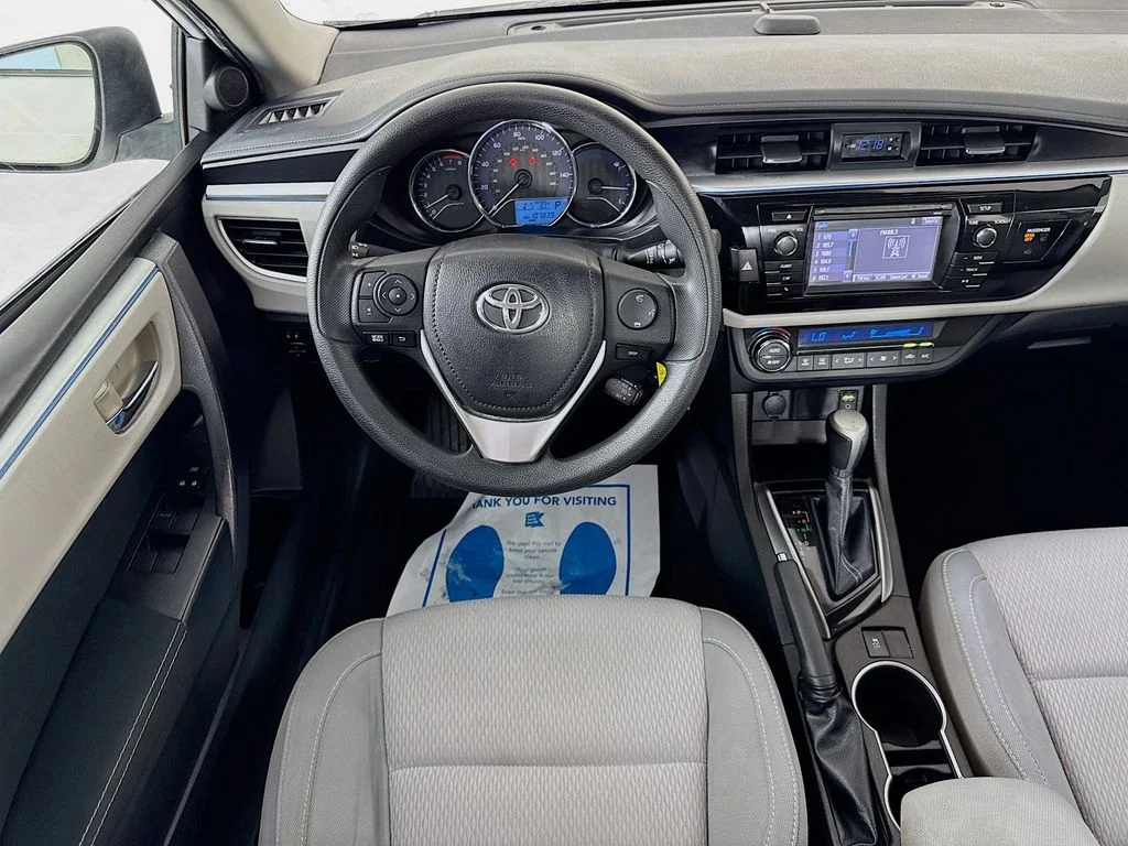 Used 2015 Super White Toyota LE image 26