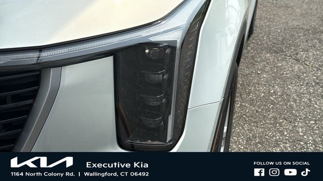 New 2026 Ivory Silver Kia LX image 7
