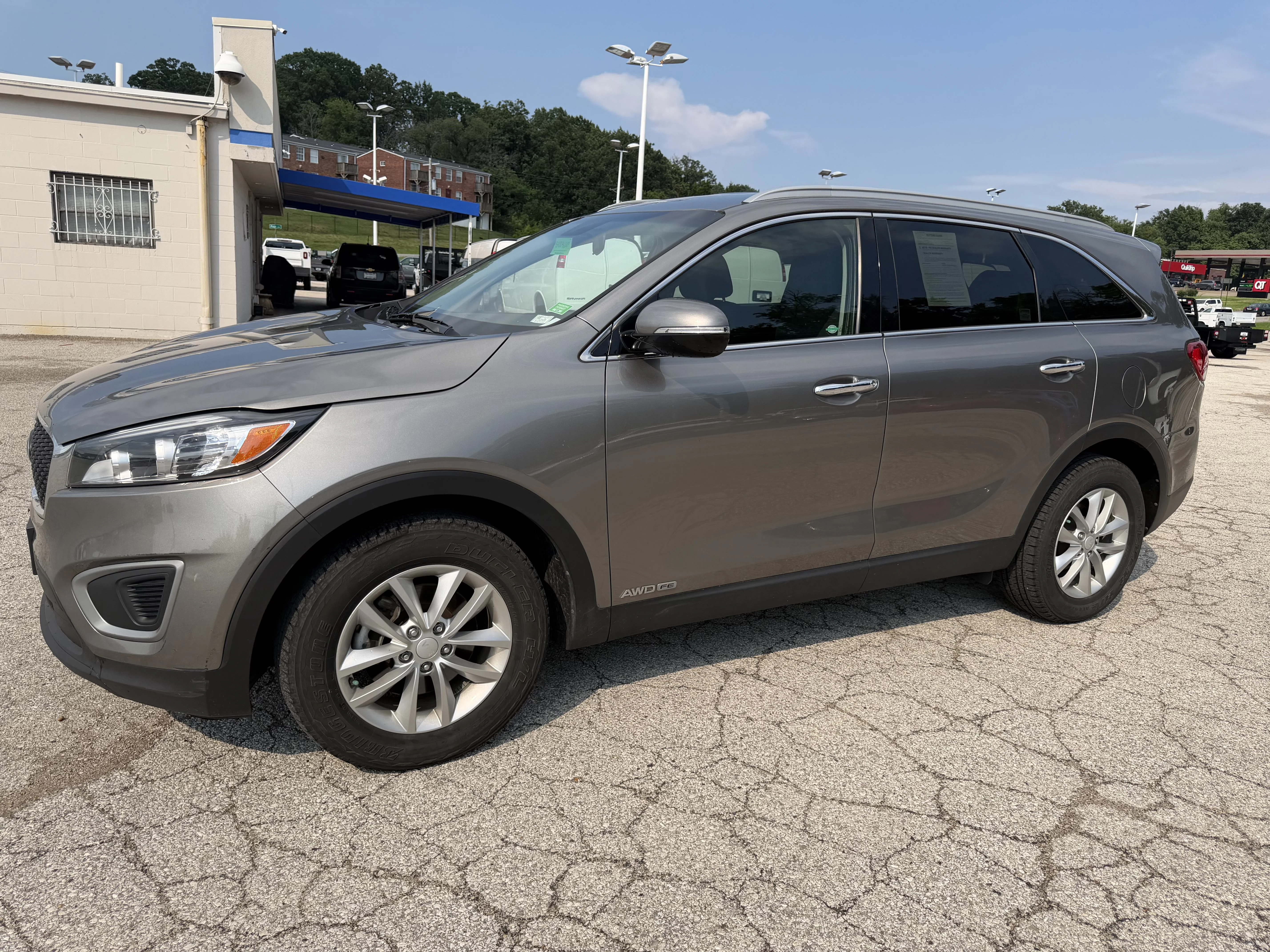 Used 2016 Titanium Silver Kia LX image 3
