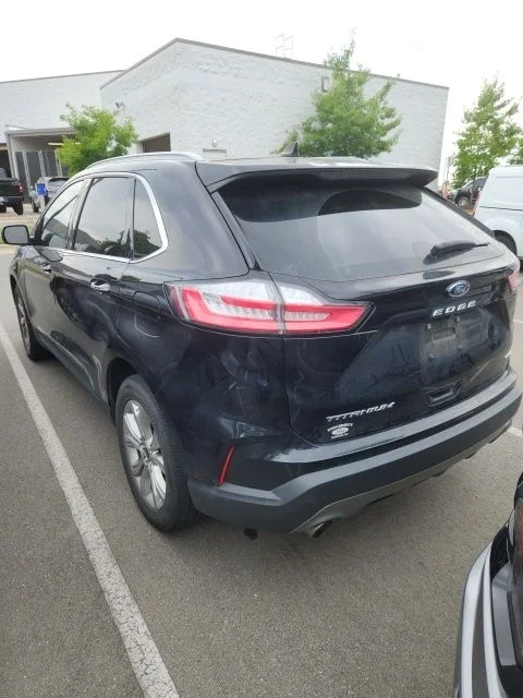 Used 2023 Black Ford Titanium image 4