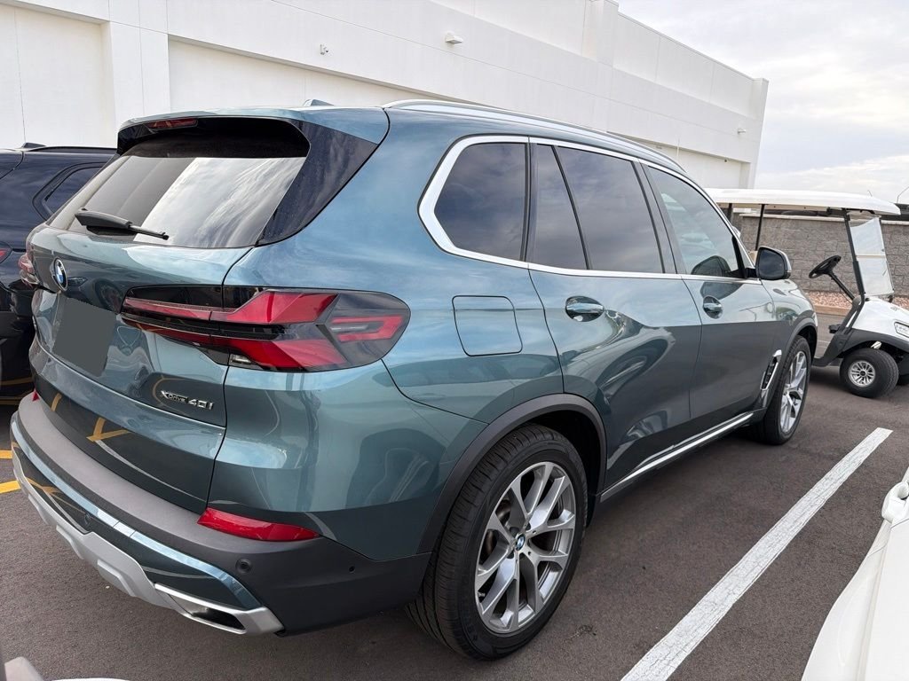 Certified Used 2024 Blue BMW xDrive40i image 4