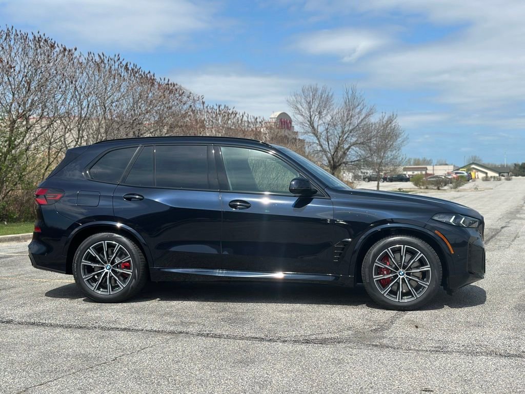 New 2026 Carbon Black Metallic BMW xDrive50e image 8